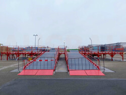 Læsseramper, der gør det muligt at læsse fire lastbiler på samme tid